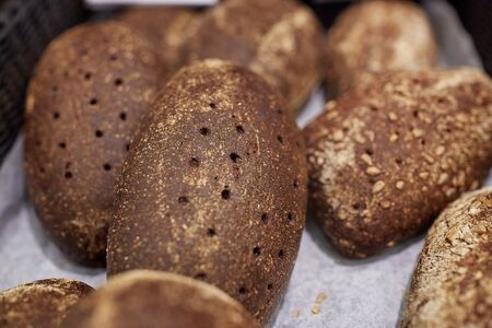 close up of rye bread at bakery or grocery storeの写真素材