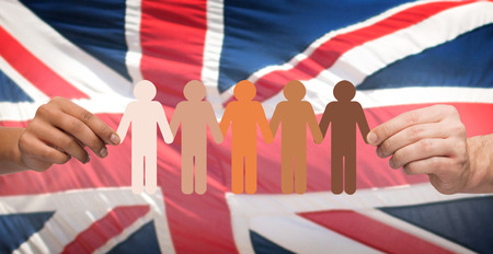 hands holding people pictogram over english flagの写真素材