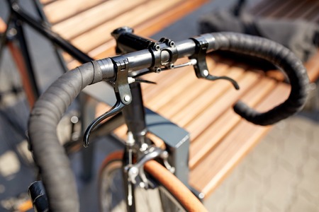 transport and vehicle concept - close up of fixed gear bicycle on street