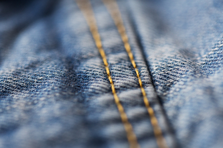 close up of stitching on denim or jeans clothesの写真素材