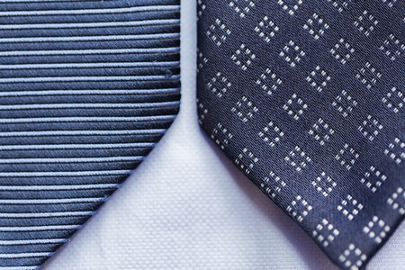 close up of blue patterned tiesの写真素材