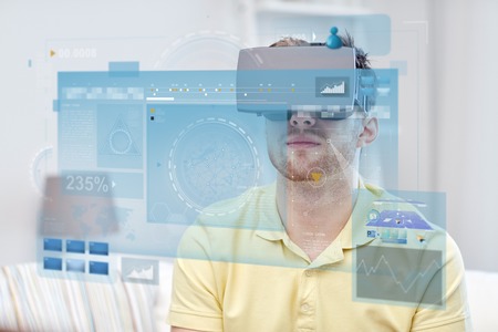 technology, augmented reality, big data and people concept - young man with virtual headset or 3d...