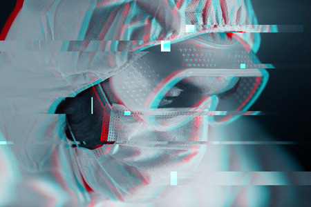 science, chemistry, biology, medicine and people concept - close up of scientist face in goggles and protective mask at chemical laboratoryの写真素材