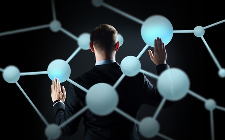 businessman touching virtual screen