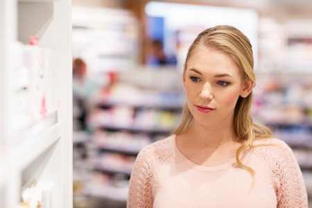 young woman at pharmacy