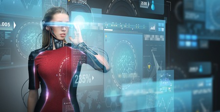 augmented reality, technology, business, future and people concept - woman in virtual glasses and microchip implant or sensors looking at screen projections over dark backgroundの写真素材