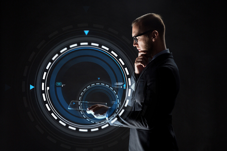 businessman with transparent tablet pcの写真素材