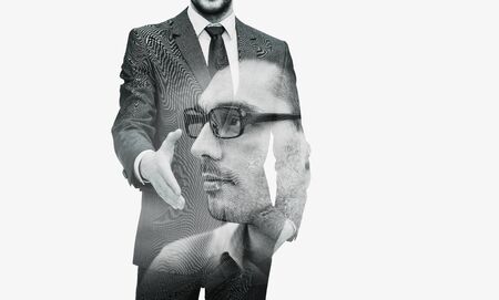 businessman with open hand ready for handshakeの写真素材