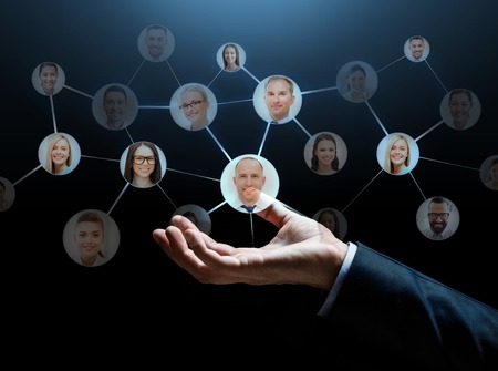 close up of businessman hand with contacts icons