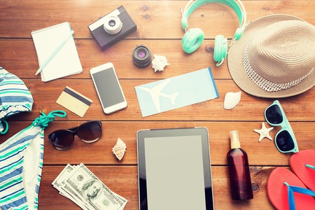 close up of tablet pc and travel stuffの写真素材