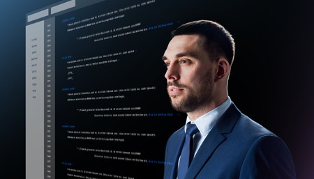businessman with coding on virtual screenの写真素材
