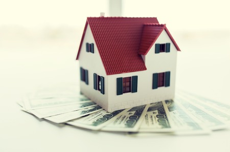 close up of home or house model and moneyの写真素材