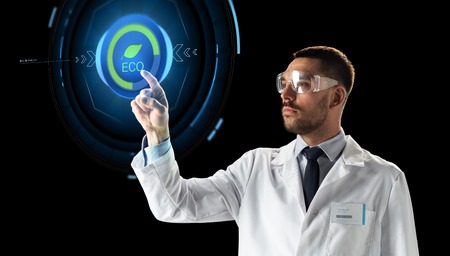 scientist in goggles with virtual projectionの写真素材