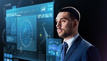 businessman with virtual screen over blackの写真素材