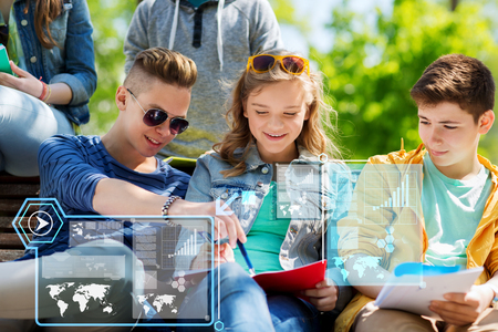 group of students with notebooks at school yardの写真素材