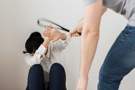 unhappy woman suffering from domestic violenceの写真素材