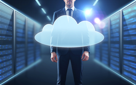 businessman in suit with virtual cloud hologramの写真素材