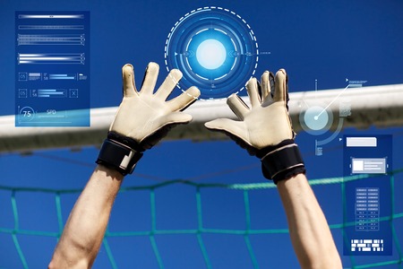 goalkeeper or soccer player hands at football goalの写真素材