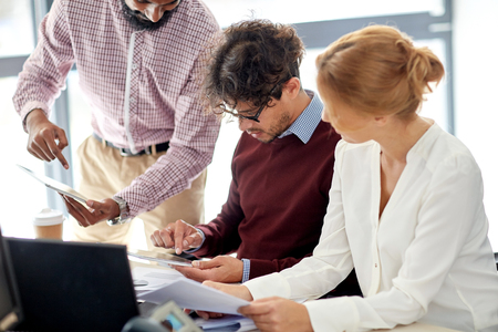 business team with tablet pc in officeの写真素材