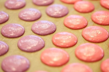 macaron batter or meringue cream on baking paperの写真素材