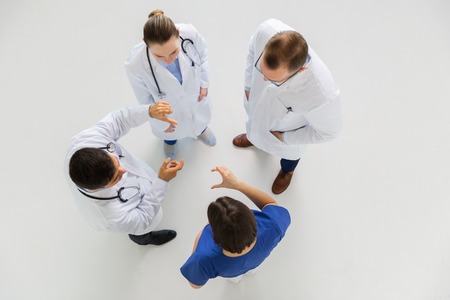 doctors working with something imaginary at hospitalの写真素材