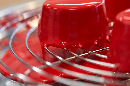mirror glaze cakes at pastry shopの写真素材