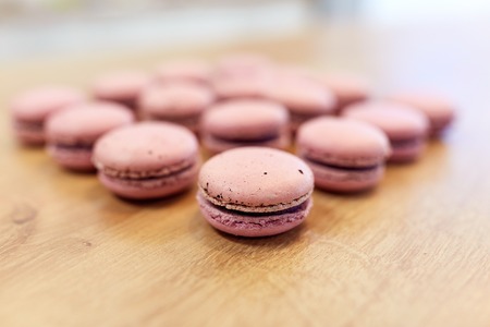 macarons on table at confectionery or bakery