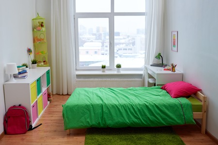 interior, home and furnishing concept - kids room with bed, other furniture and accessoriesの写真素材