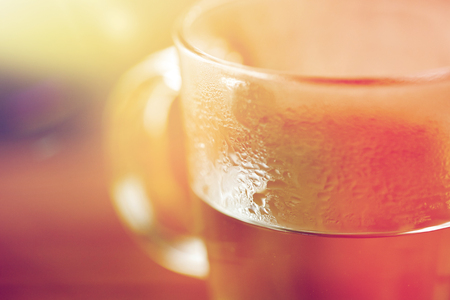 drink concept - close up of glass with hot waterの写真素材