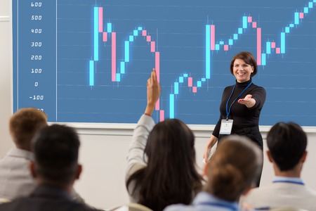 business, economy and people concept - smiling businesswoman or financier with forex chart on...