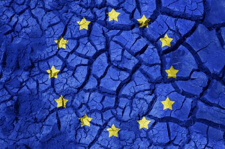 flag of europe on cracked ground backgroundの写真素材