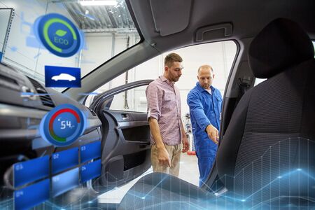 auto mechanic and man at car shopの写真素材