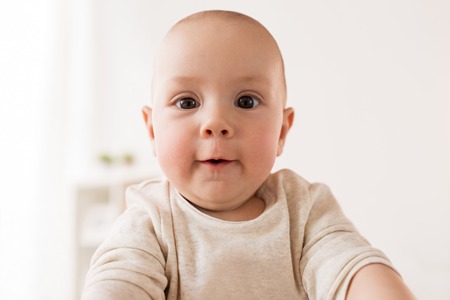 close up of happy little baby boy face