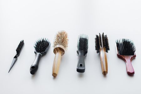 different hair brushes or combsの写真素材