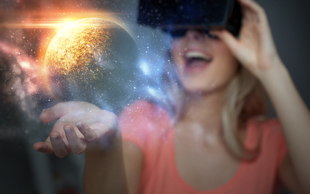 woman in virtual reality headset or 3d glasses