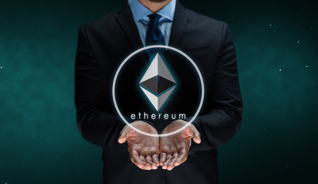 close up of businessman with ethereum over spaceの写真素材