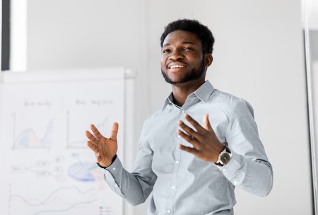 businessman with flip chart at office presentationの写真素材