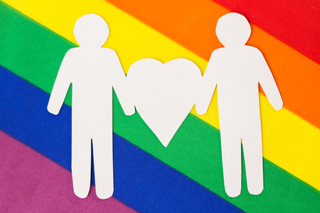 male couple pictogram on rainbow flag backgroundの写真素材