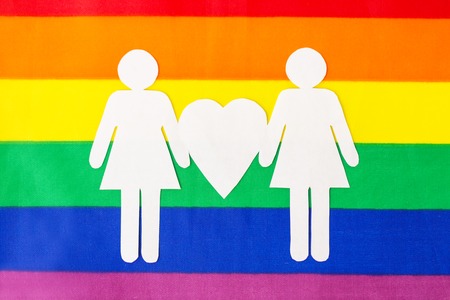 female couple pictogram on rainbow flag backgroundの写真素材
