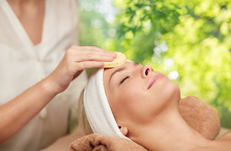 close up of woman having face massage in spaの写真素材