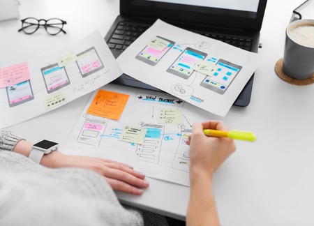 web designer working on user interface at office