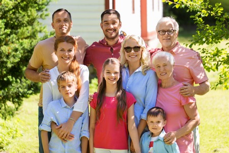 happy family portrait in summer gardenの写真素材