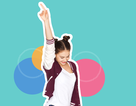 happy smiling teenage girl dancingの写真素材