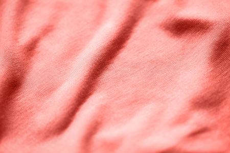 textile or fabric texture in living coral colorの写真素材