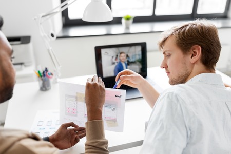 creative team having video conference at officeの写真素材