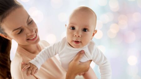 happy mother with little baby boyの写真素材
