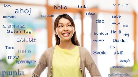 asian woman looking up over foreign languages