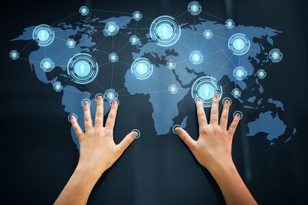 hands using interactive panel with network icons