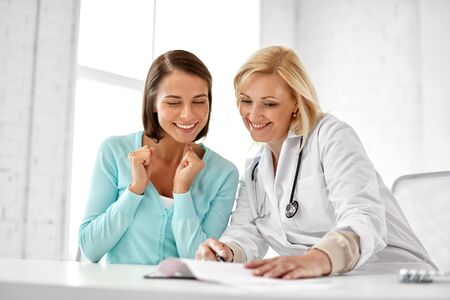 doctor happy woman patient at hospitalの写真素材