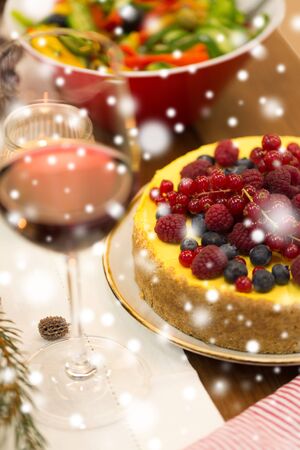 close up of cake and other food on christmas tableの写真素材